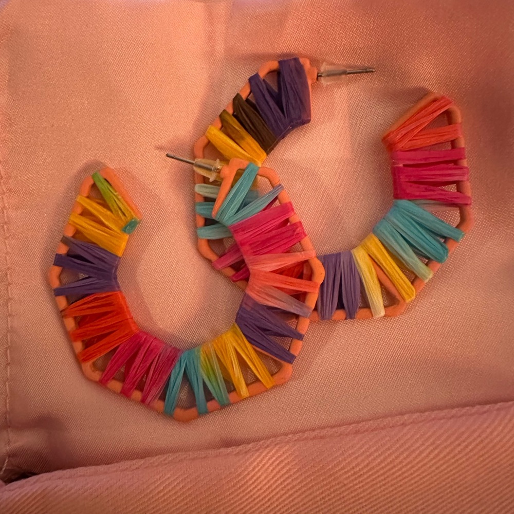 Brand new colorful earrings 
Original case. Never opened